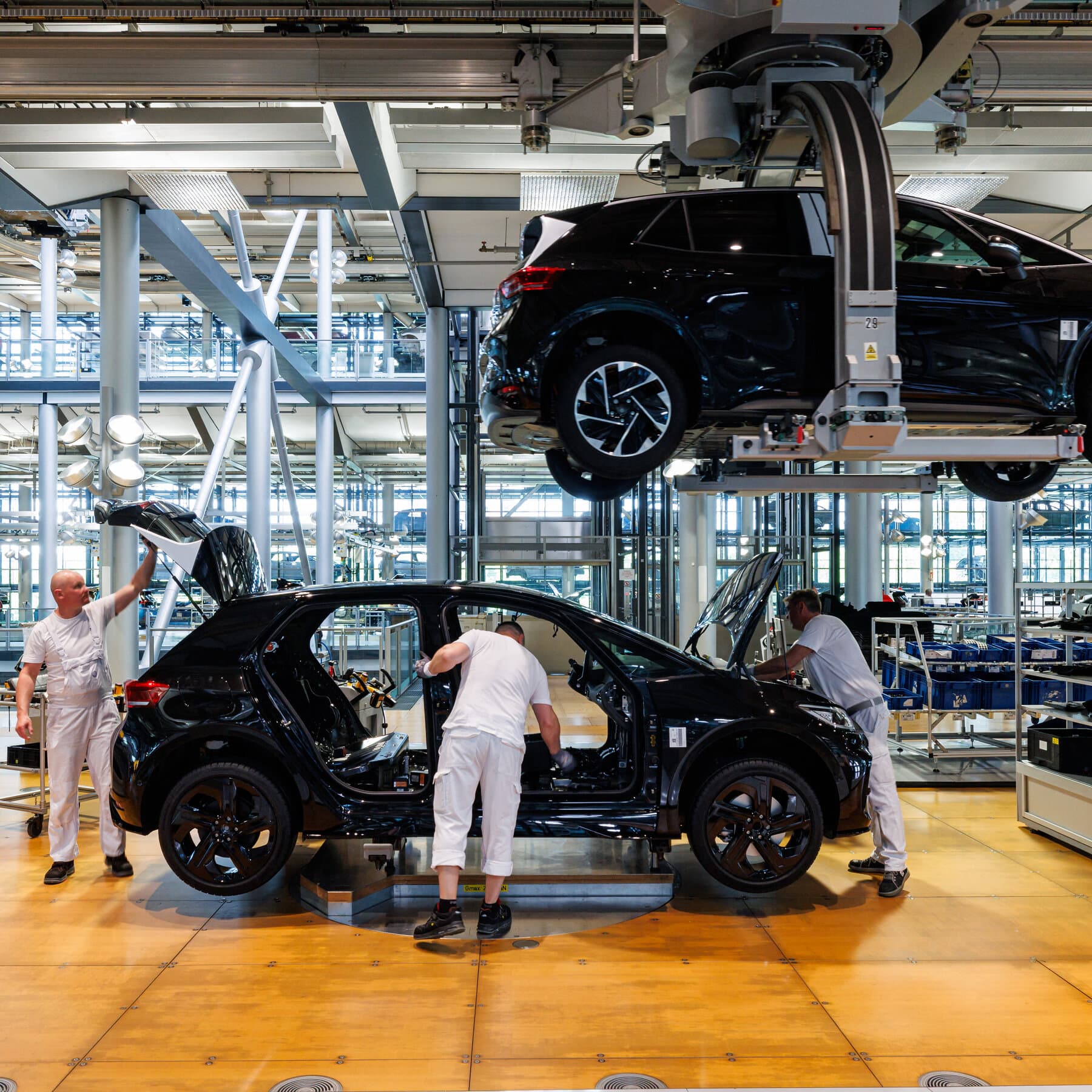 Infographic illustrating Volkswagen's job cuts and production capacity reductions in 2026.