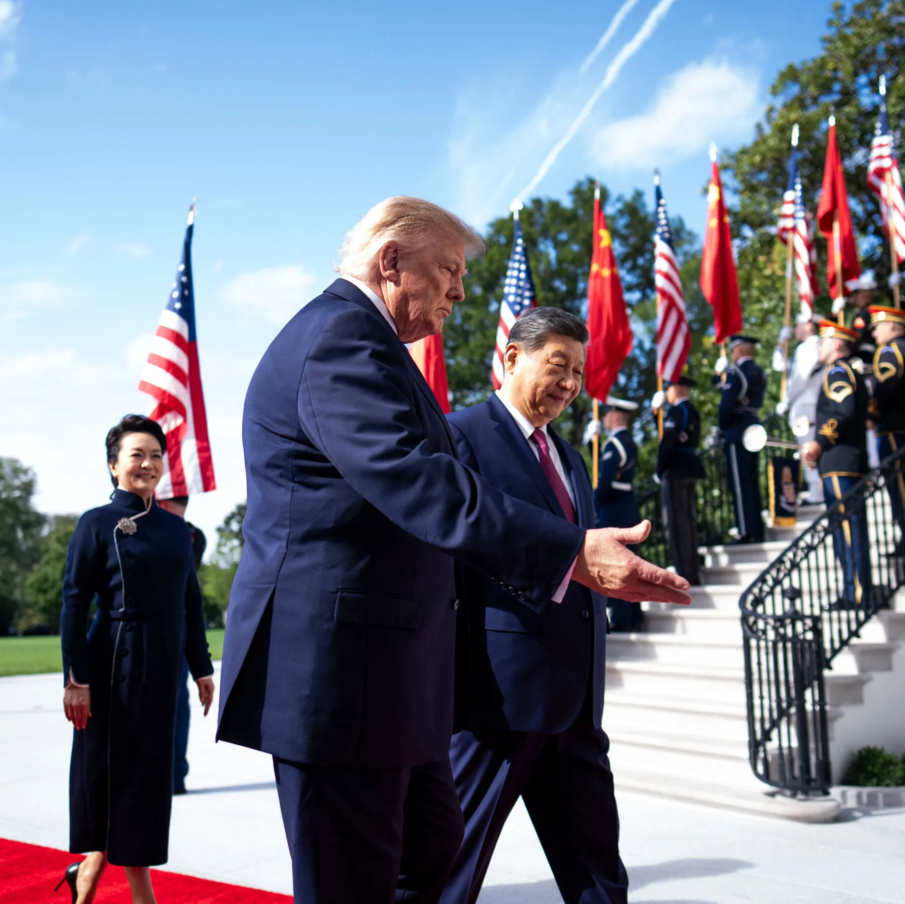 Infographic showing U.S.-China trade truce timeline and tariff rates.