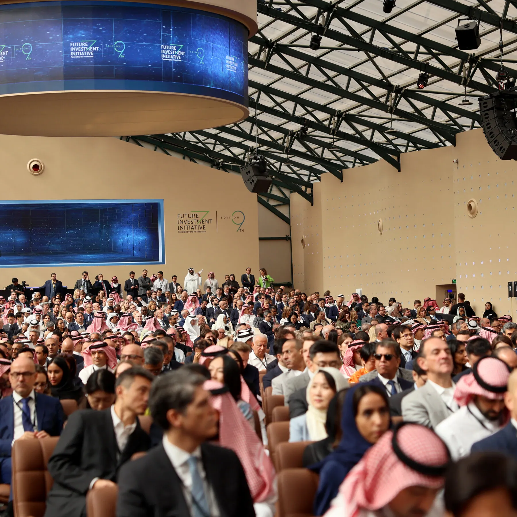 Infographic detailing the postponement of Saudi Arabia's Future Investment Initiative conference due to Houthi attacks.