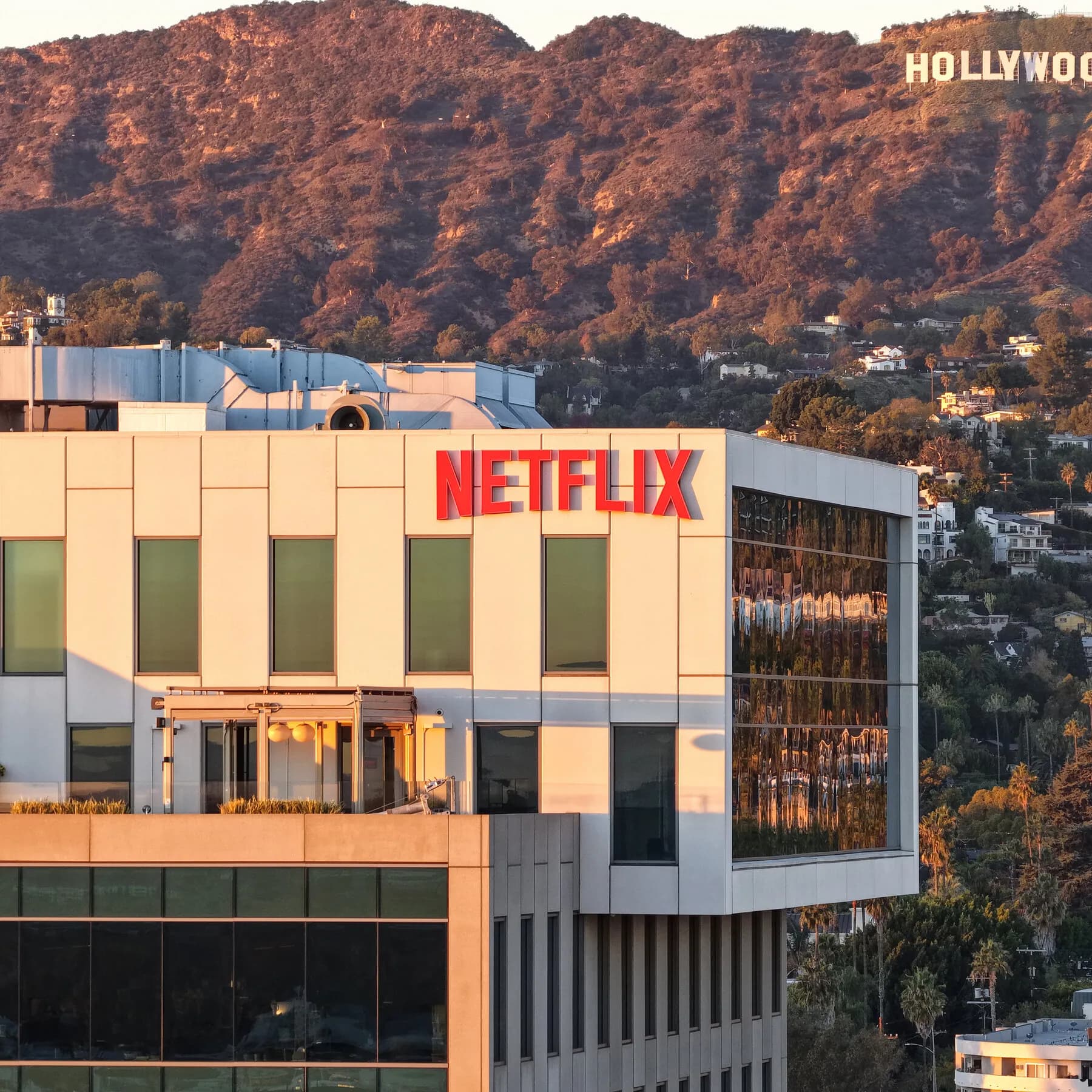 Infographic showing Netflix's Q3 revenue growth and executive changes in 2026.