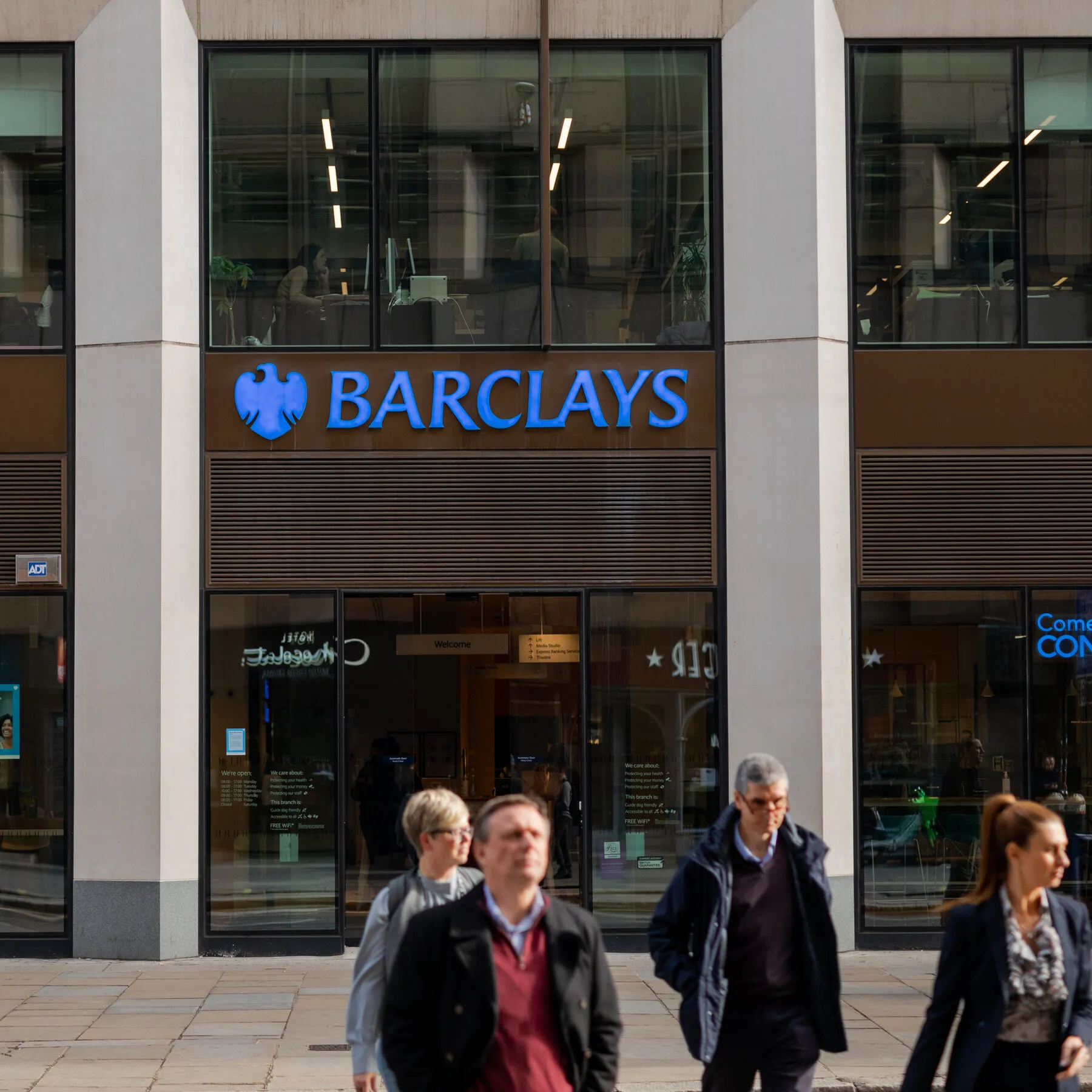 Infographic showing Barclays' job cuts by function, emphasizing the shift towards AI roles.