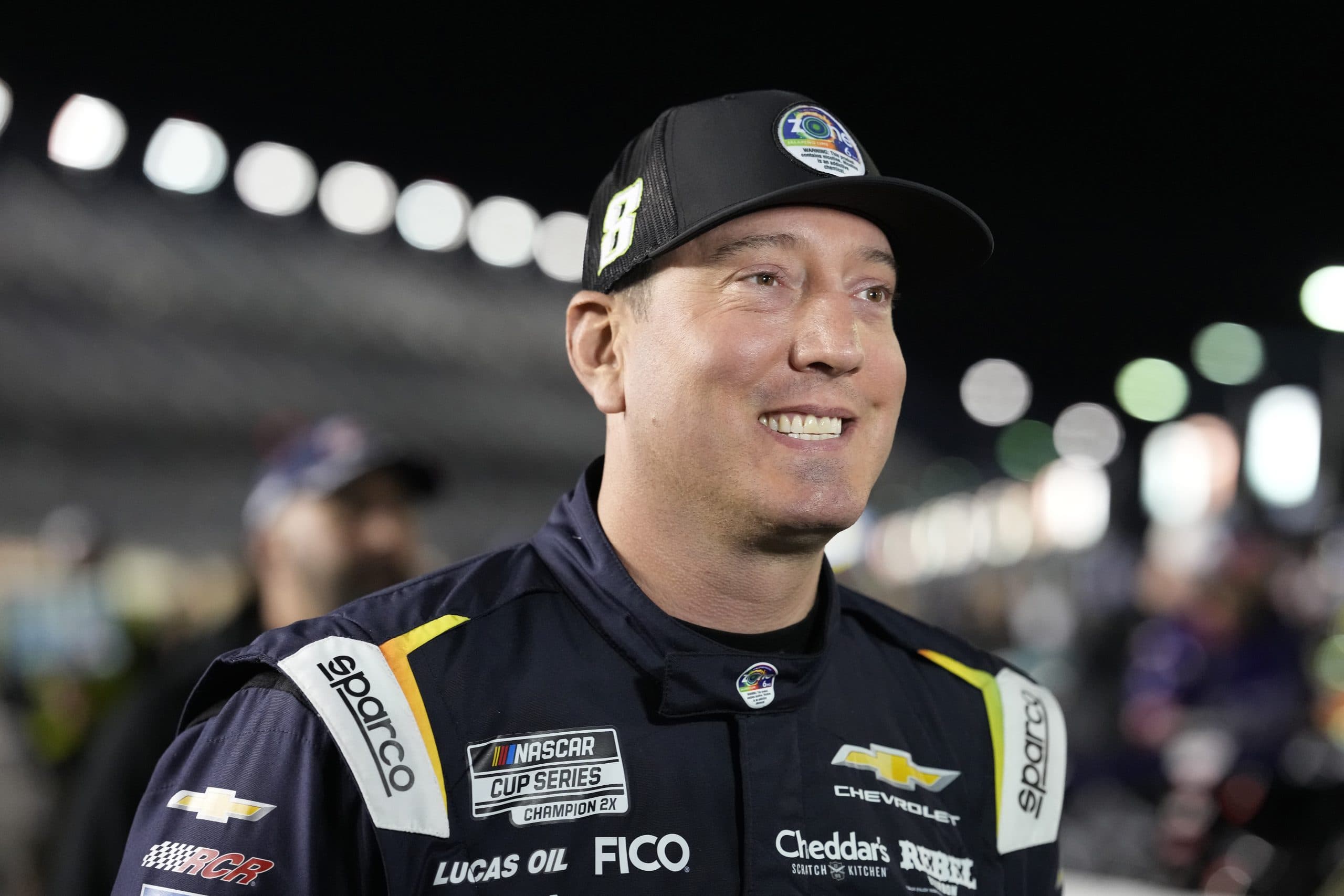 A tribute graphic featuring Kyle Busch's car and the number 63, representing his legacy in NASCAR.