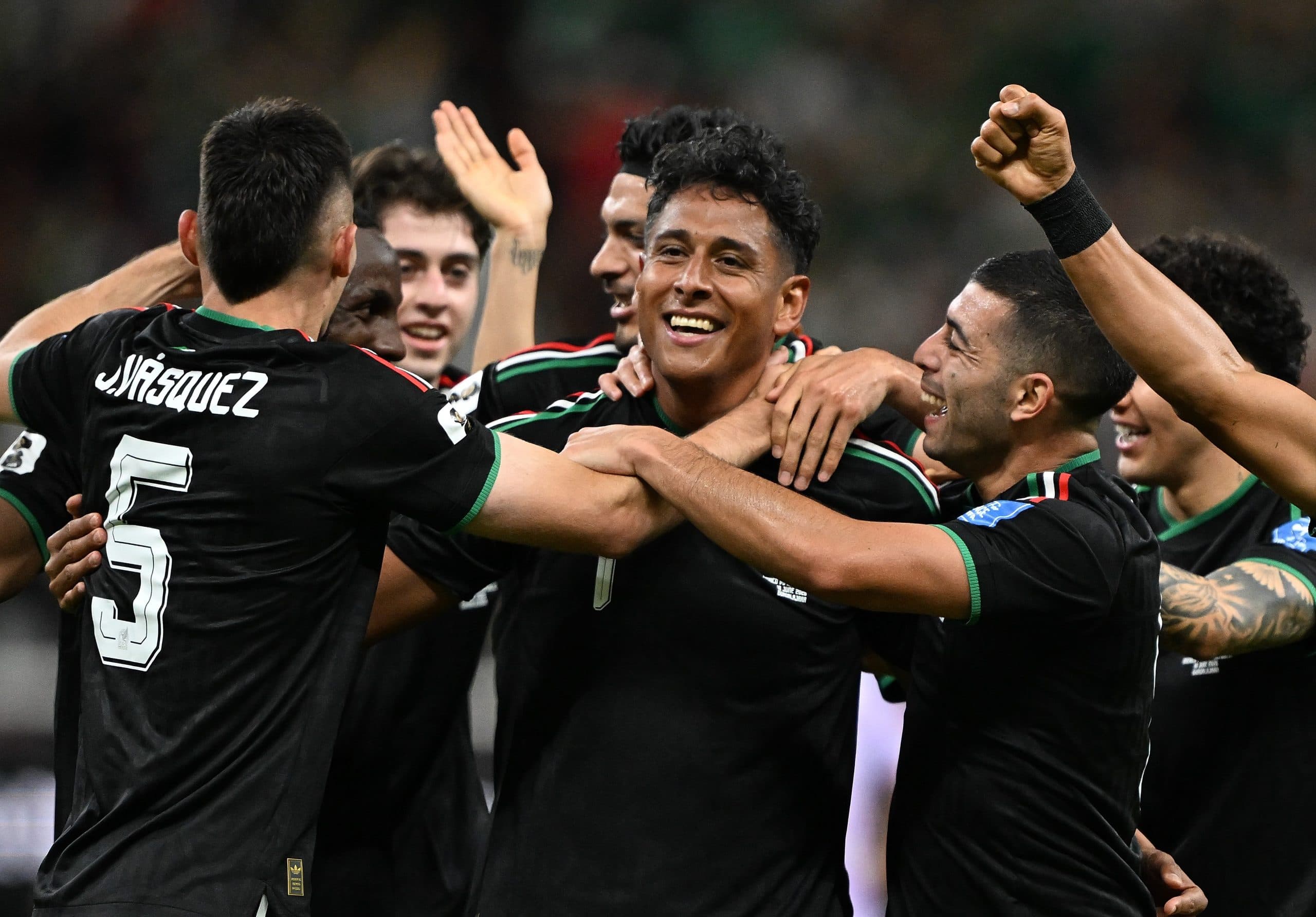 Fans celebrating during the 2026 FIFA World Cup knockout stage.