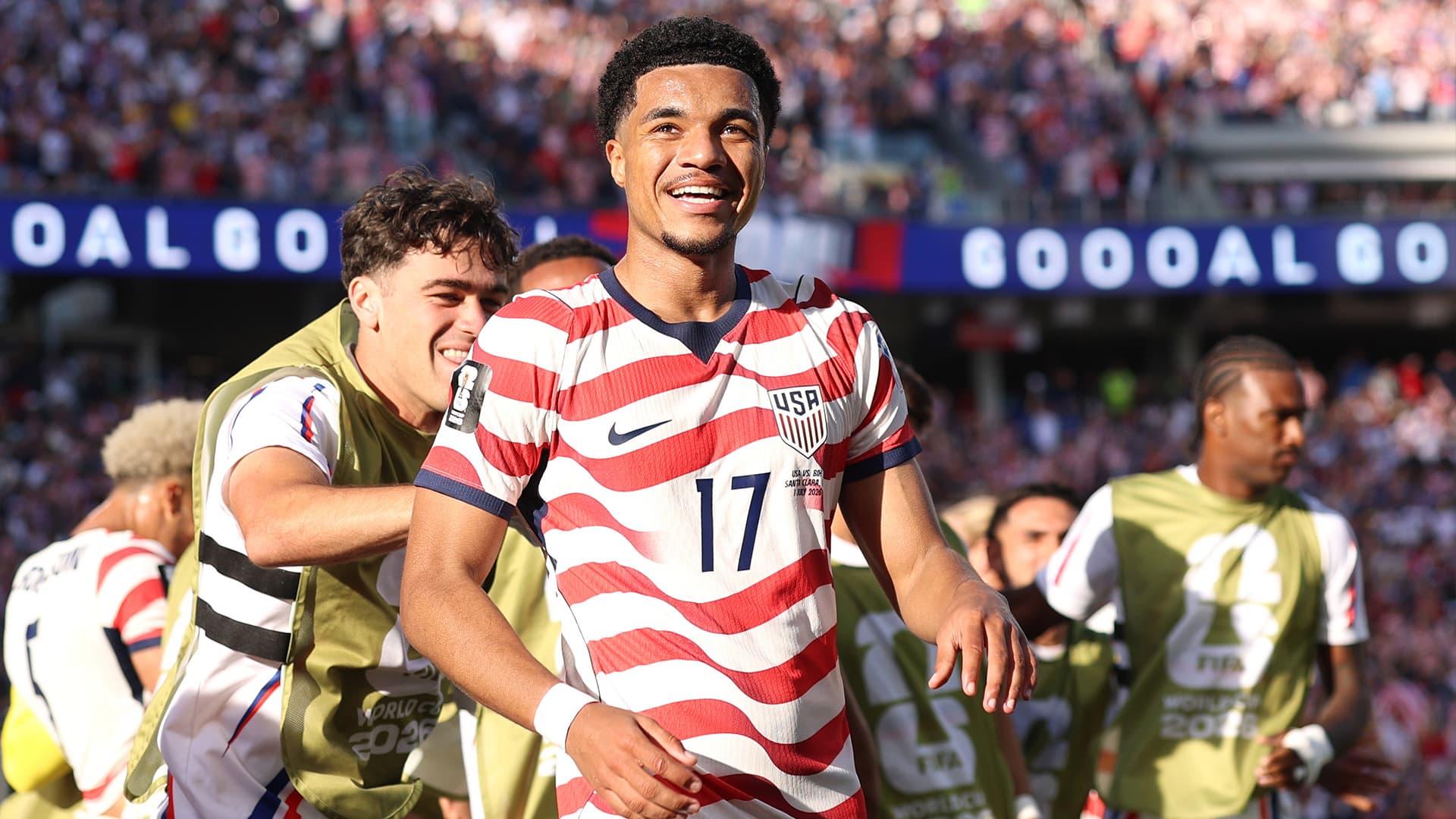 USMNT players celebrating their historic World Cup knockout stage victory
