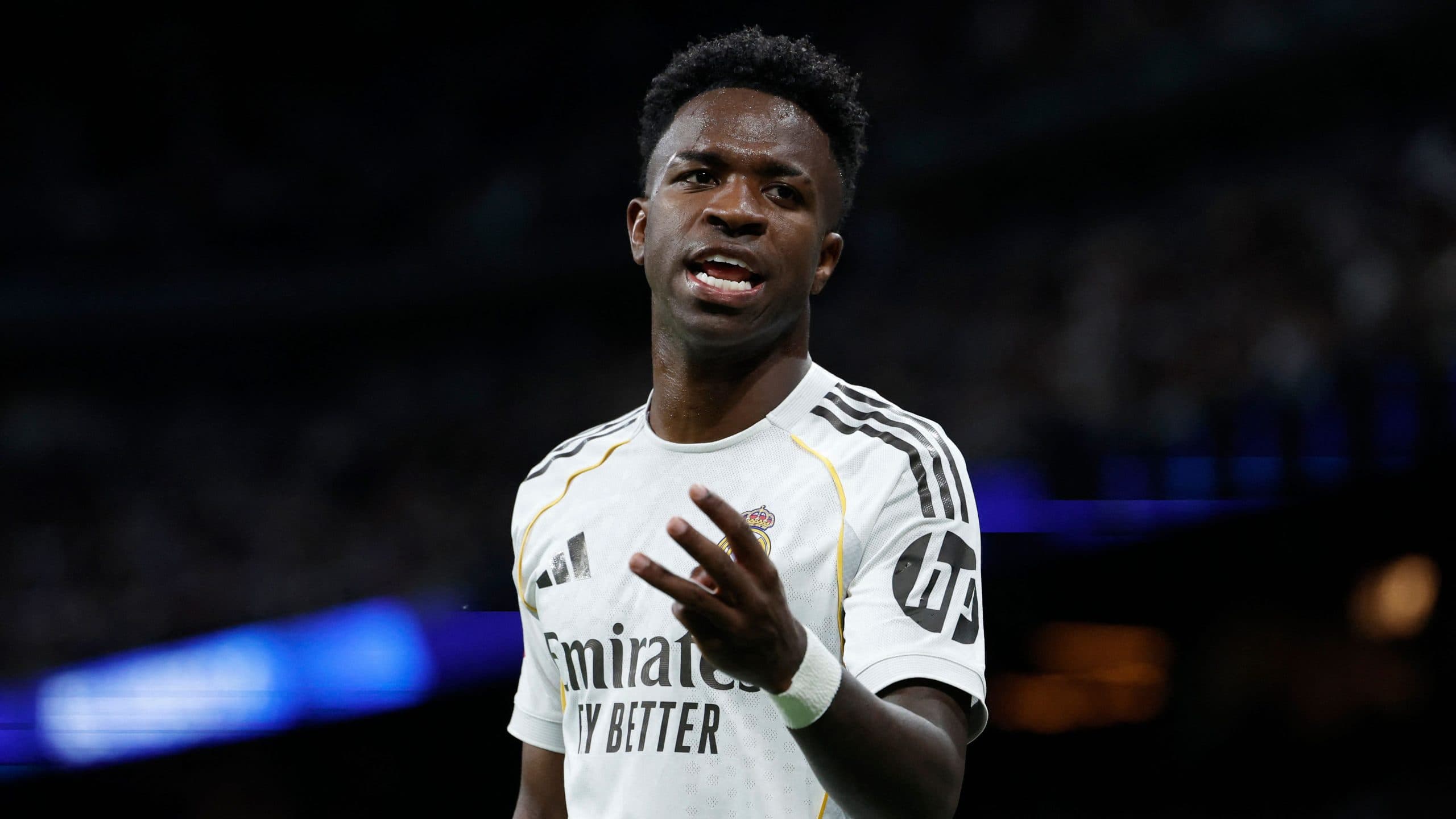 Vinicius Junior in action during a match, with a focus on his contract situation.