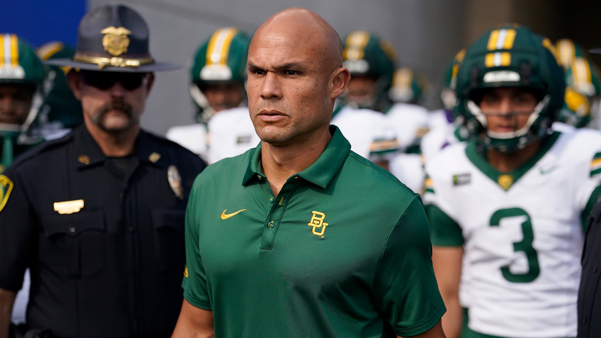 Minimalist dark graphic showing the text 40-40 representing Dave Aranda tenure at Baylor
