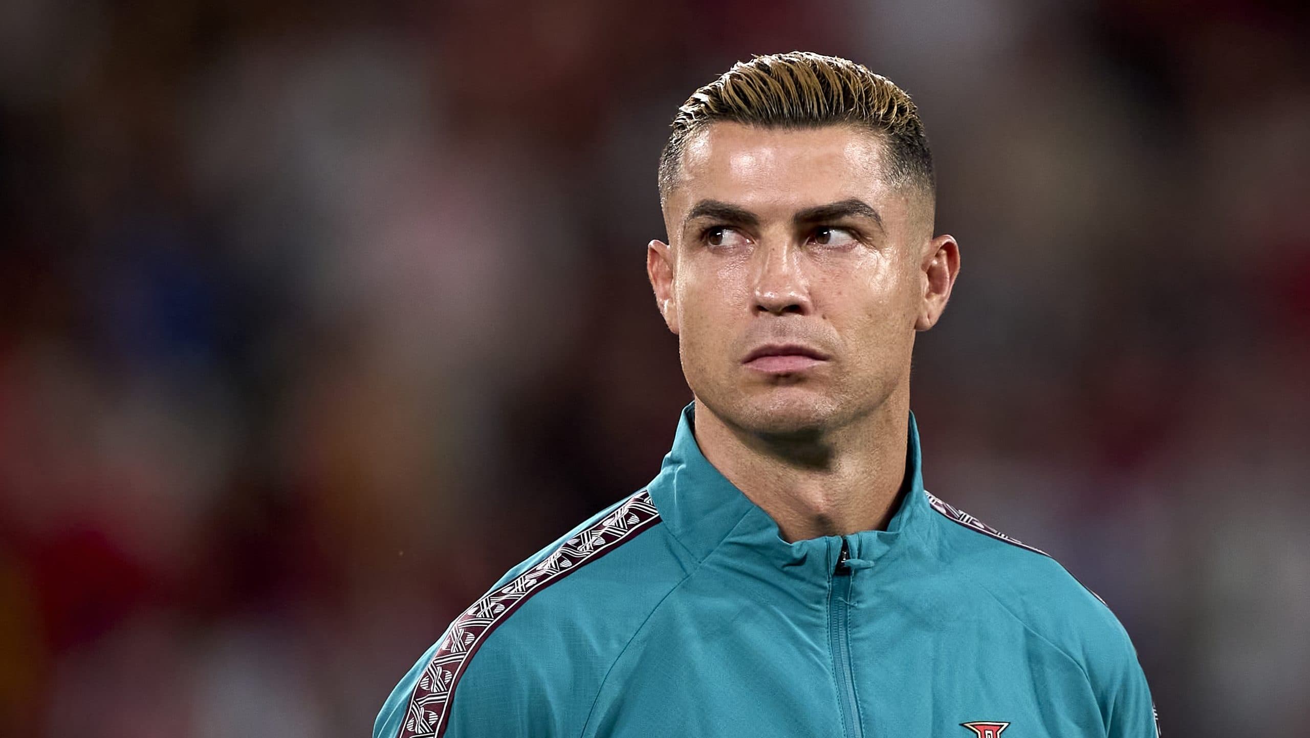 Cristiano Ronaldo during a match, highlighting his suspension from the national team.