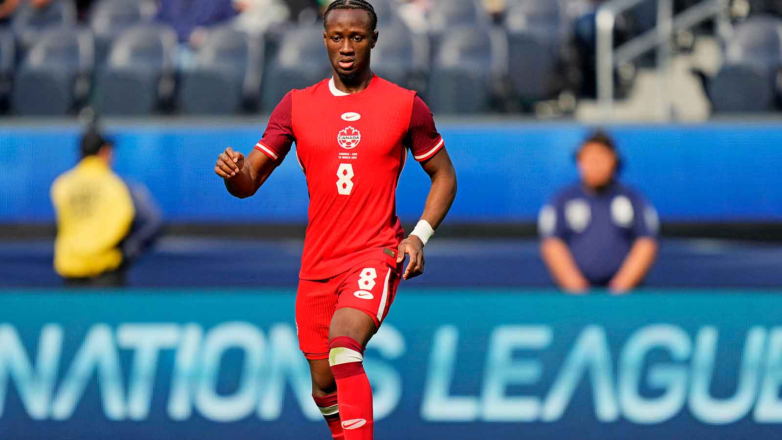 Ismael Kone being carted off the field during the World Cup match against Qatar.