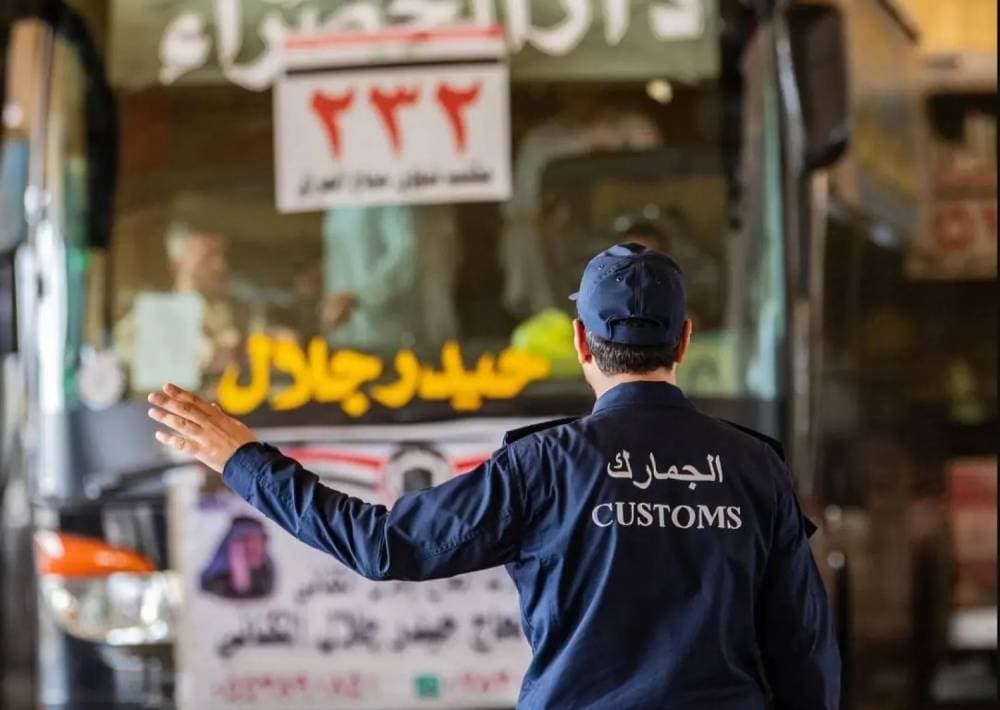 ZATCA officials inspecting seized contraband items in Saudi Arabia.