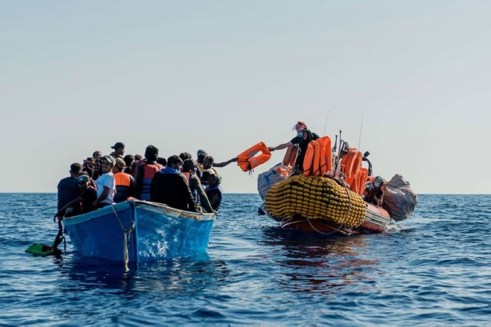 European Parliament session discussing migration law changes