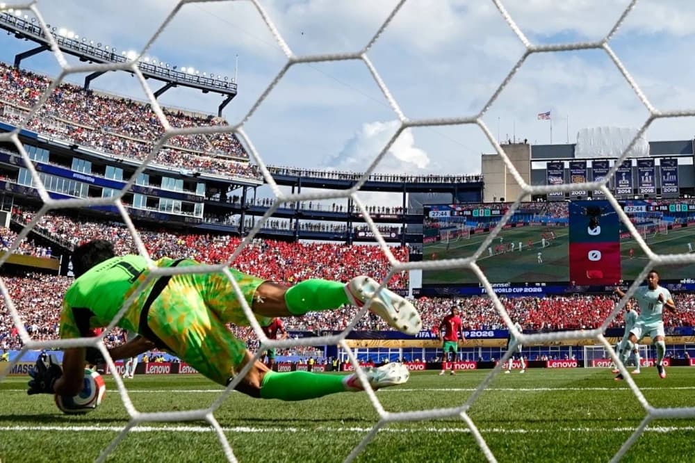 Yassine Bounou making a historic penalty save during the World Cup.