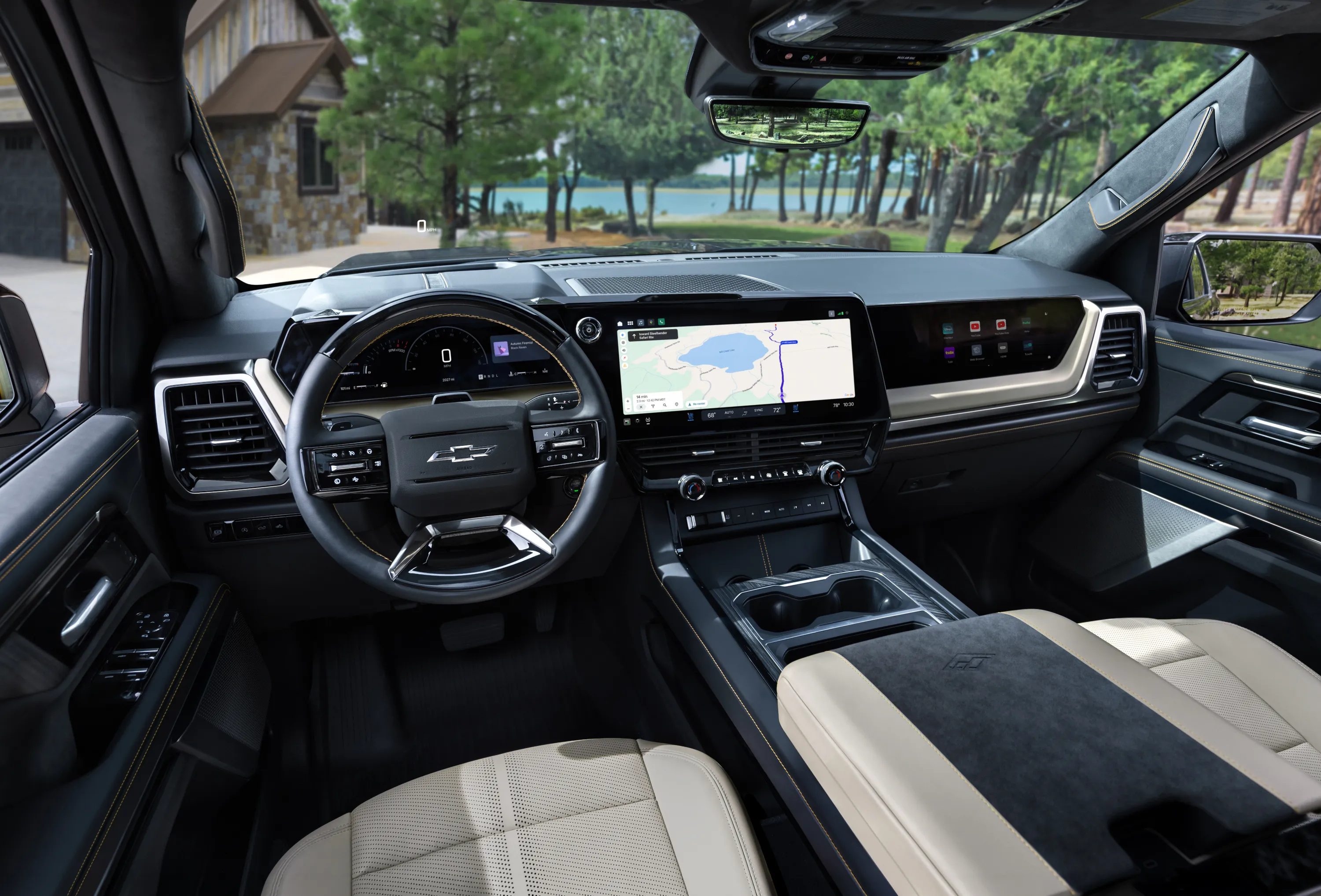 A modern truck dashboard displaying GM's new infotainment system with Apple CarPlay and Android Auto integration.