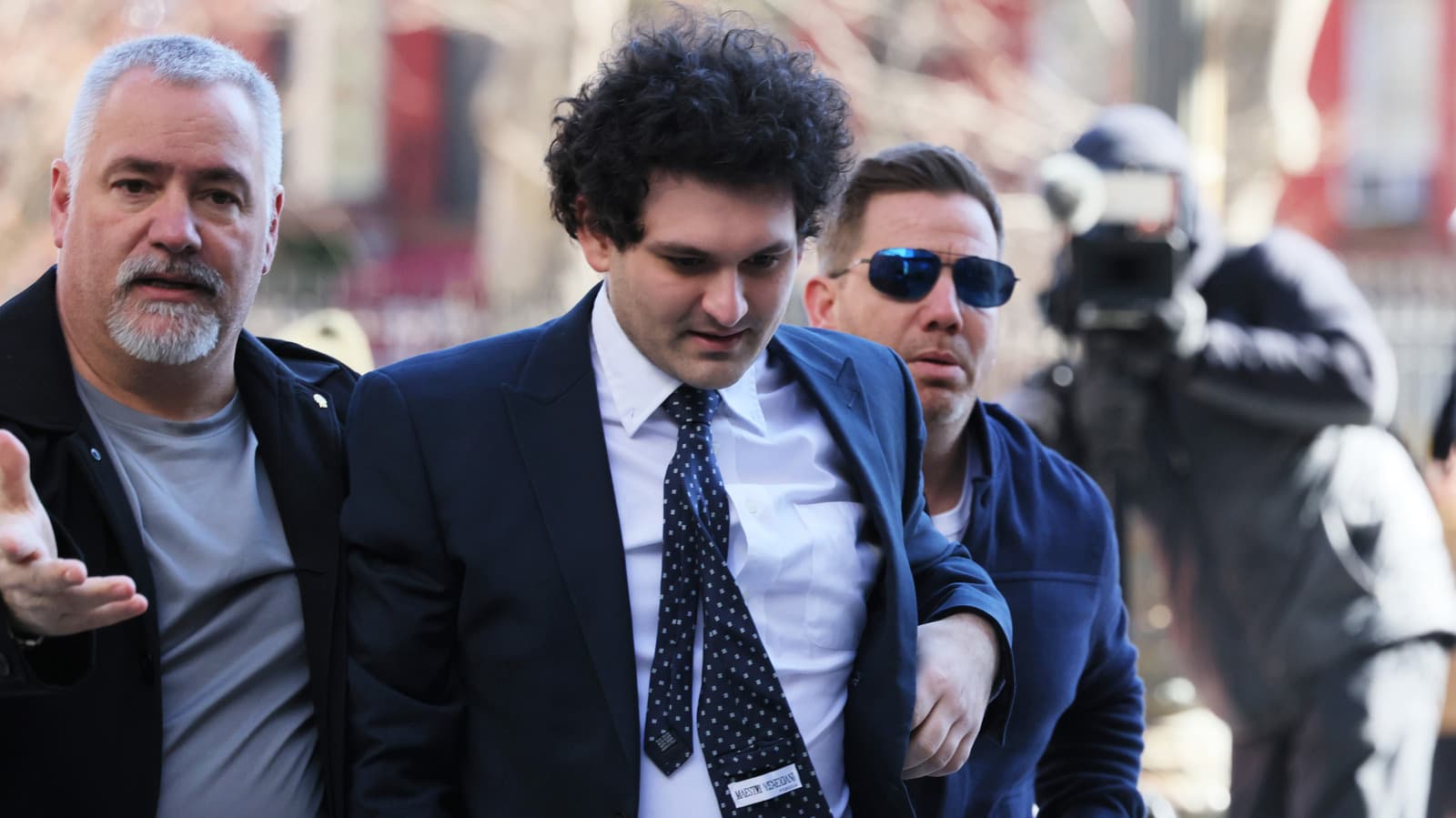 Infographic detailing Sam Bankman-Fried's fraud conviction and its impact on the cryptocurrency market.